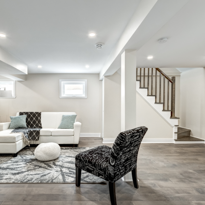 Living room in a basement, white walls and modern design